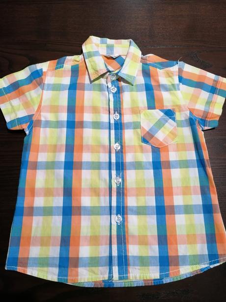 Oranzovkasta košeľa, 92