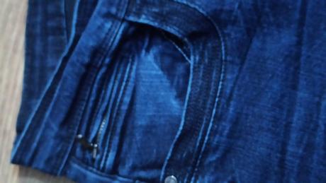 Rifle tmavé (hrubšie) elastické,takmer nenosené, denim,38