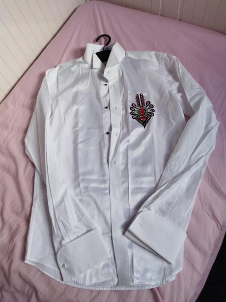 Krojova biela košeľa, 39