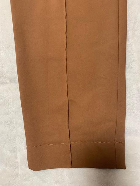 Hrubšie elastické nohavice škoricovej farby, l / m