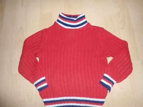 Cerveny svetrik, 122