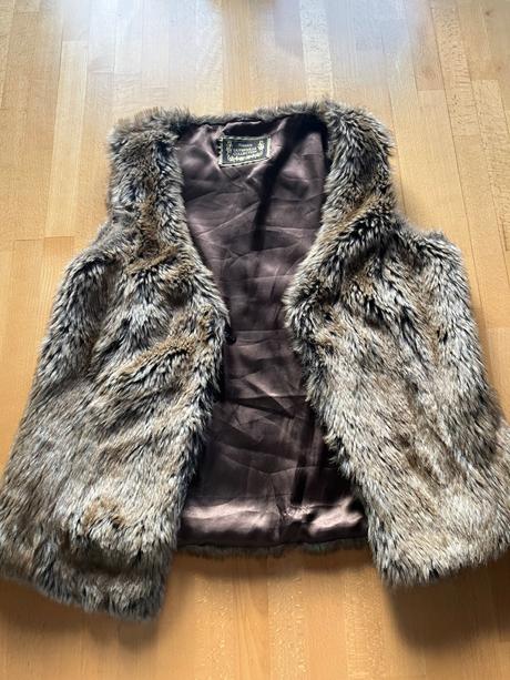 Teplá dámska kožušinová vesta m/40-42, 42