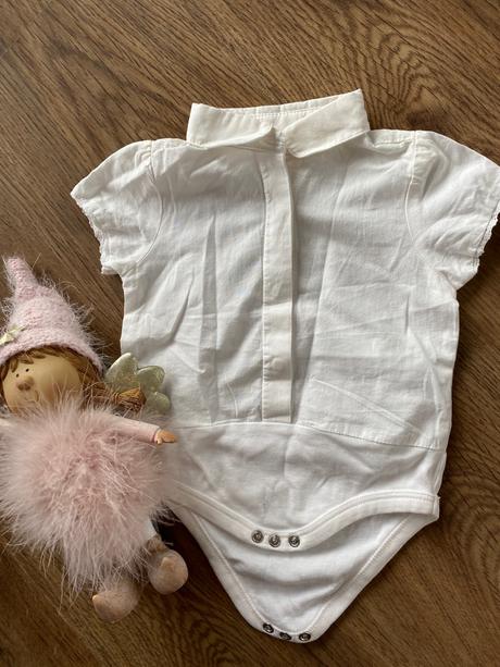 Košeľové body, 56