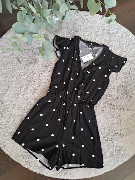 Bodkovaný overal, 38