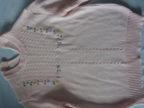 Ružový pulovrík, 122