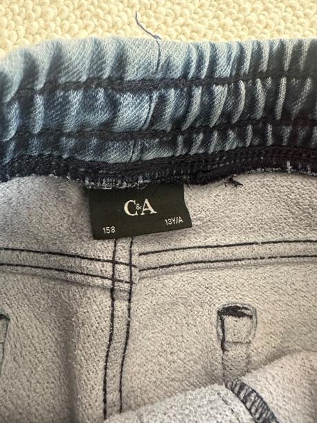 Oteplené džínsy, c&a,158