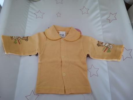 Tričká na gombíky, 62