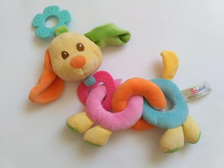 Hrkálka psík zložená z kolečiek,