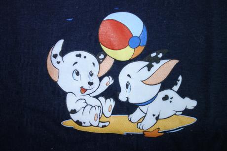 Tielko psíkovia s loptou, 134