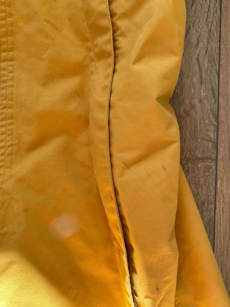 Kombinéza do dažďa, 92