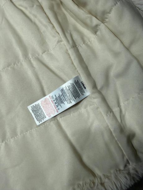 Kožušinová vestička, 134