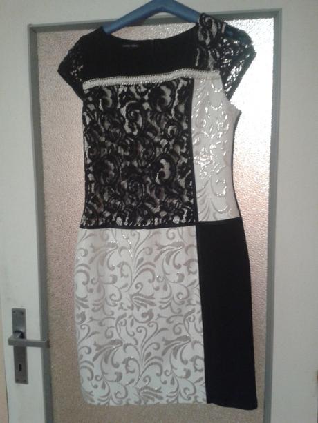 Bieločierne šaty, 39