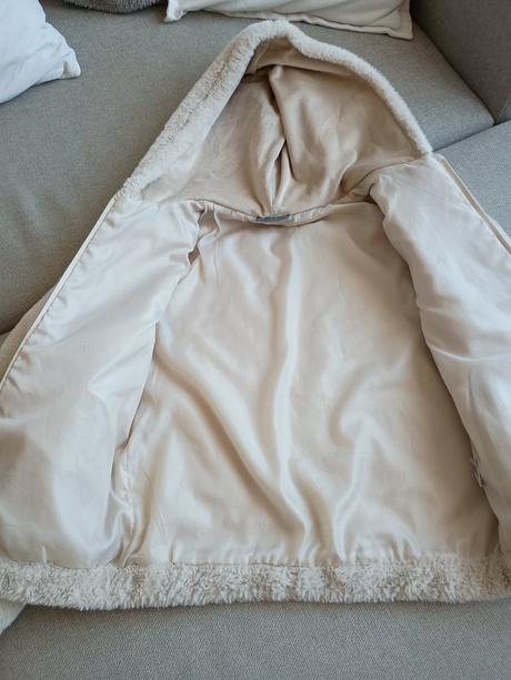 Kožušinová bunda, 158