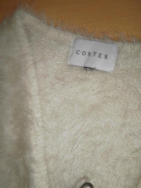 Vesta z obsahom peria, 42