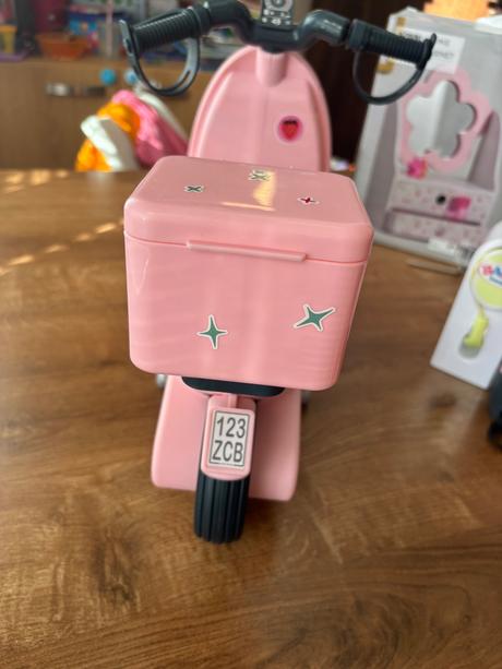 Motorka s prilbou baby born,