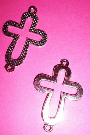 Kovový komponent v tvare krížika, 