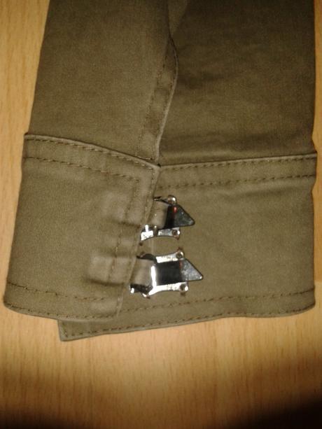 Olivova bundička, 38