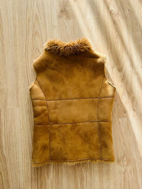 Skvelá kožušinková vesta značky marks & spencer, marks & spencer,116