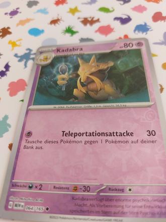 Zberateľská kartička pokémon kadabra,