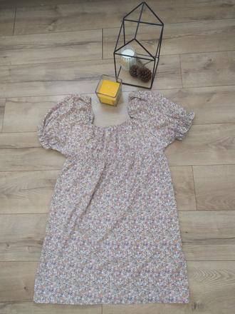 Kvetovane šaty, 42