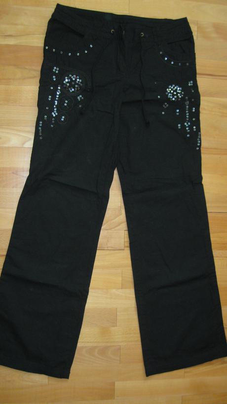 Nohavice s flitrami, 32