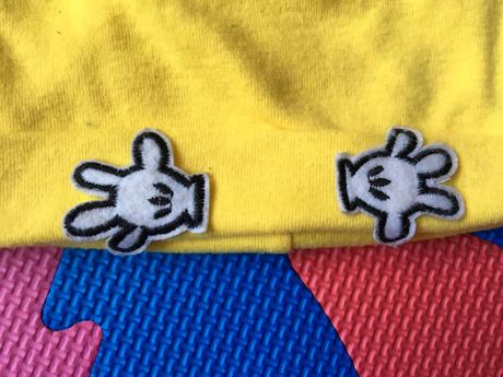 Žltá prechodná čiapka s rúčkami a uškami, 74