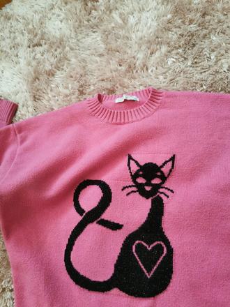 Sveter s mačkou, 134