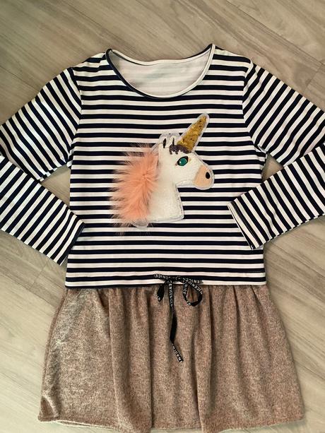 Šaty s jednorožcom, 164