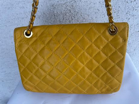 Kozena kabelka prava koza zlta,