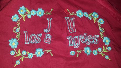 Menčestrové sako s výšivkou l, l