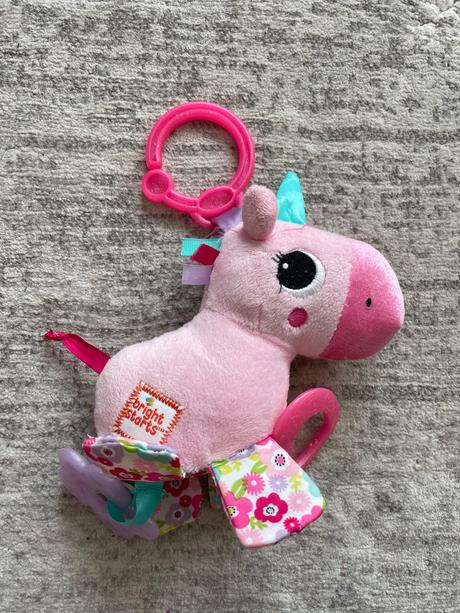 Hračka na kočík bright starts jednorožec,