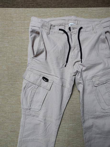 Béžové nohavice, denim,32