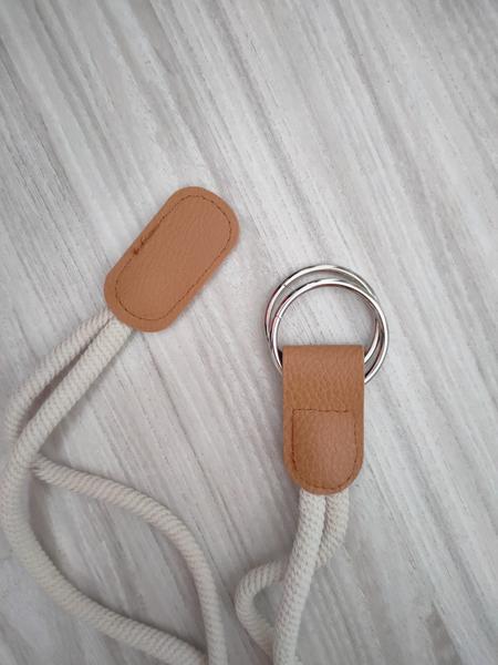 Ako sa viaže opasok s dvomi krúžkami?