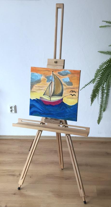 Maľba plachetnica pri západe slnka,