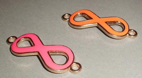 Kovový komponent v tvare ležatej osmičky, 