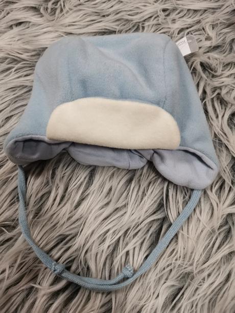 Bledomodrá čiapka, 68