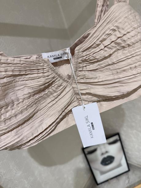 Top kamila sikl, s