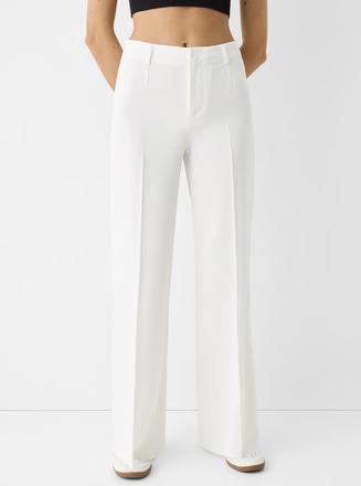 Nohavice s pukmi, bershka,42