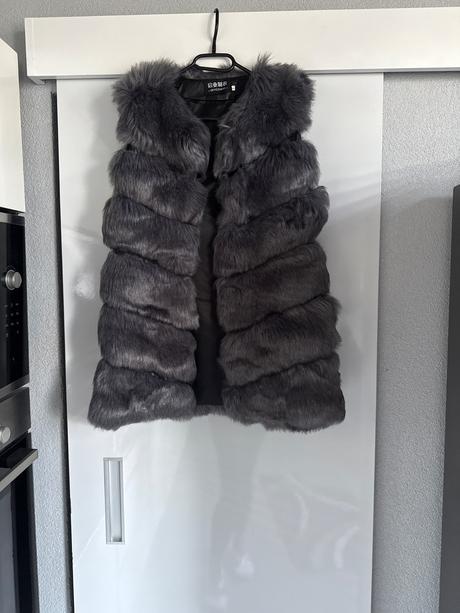 Kožušinova vesta, l