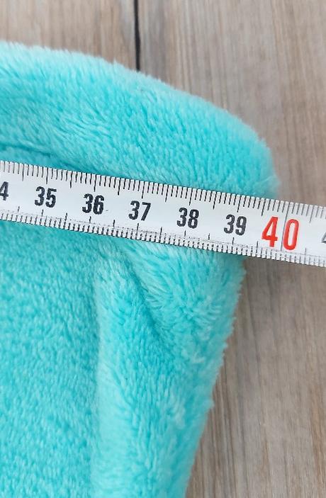 Flisová deka v tvare plutvy,