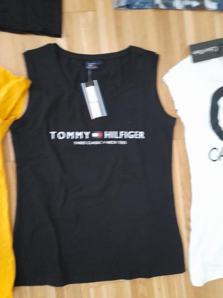 Nové a zánovné dámske tričká veľkosť m,l cena 4e,, l