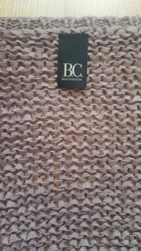 Šedofialový sveter, 42