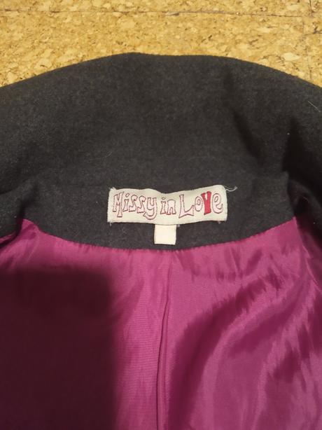 Flaušový kabát, 116