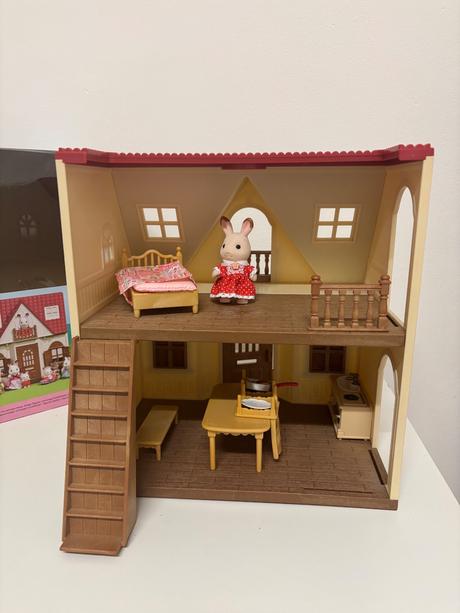 Syvanian - dom s červenou strechou, 