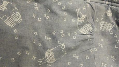 Kombinéza s uškami, 86