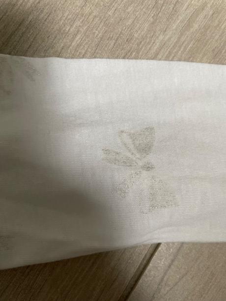 Tričko so striebornými motýlikmi, 116