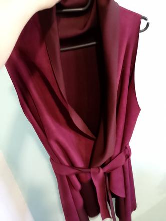 Vesta s opaskom nenosena, 