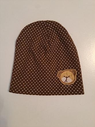 Prechodná čiapka, 74