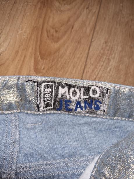 Metalické nohavice, 128