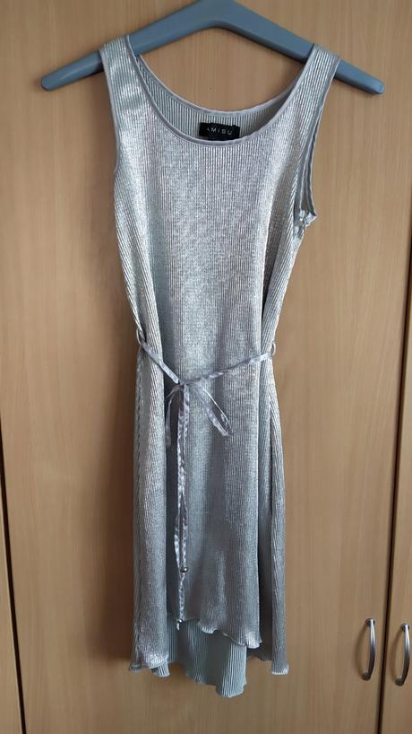 Strieborné šaty, 34